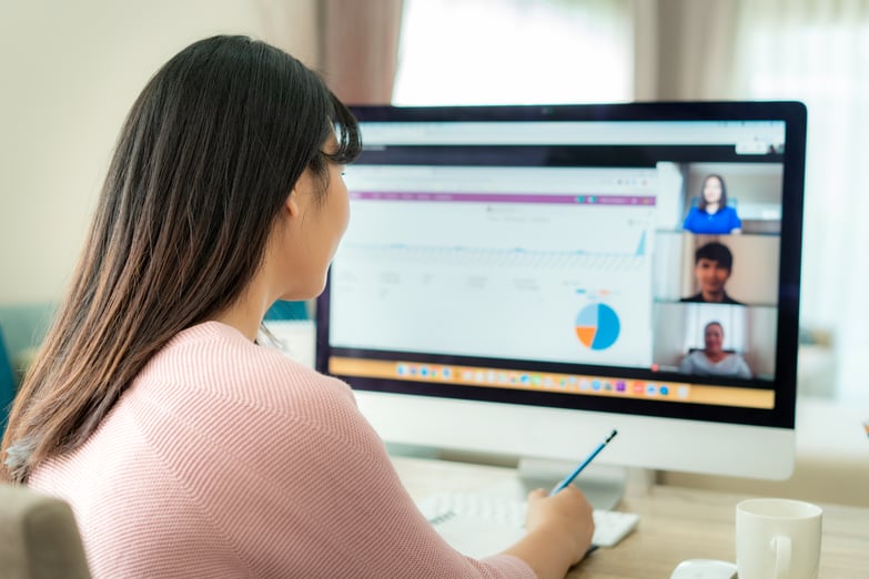 Woman working remotely on video call