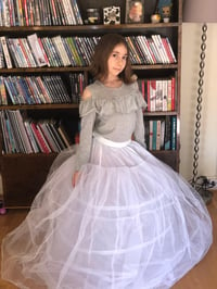 Girl in a hoop skirt